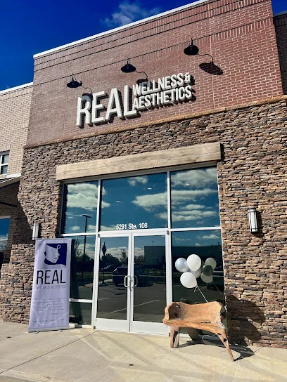 REAL Wellness & Aesthetics logo