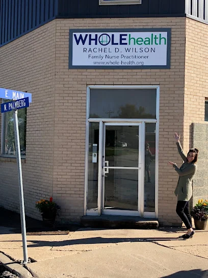 WHOLEhealth + The Vault Aesthetic logo