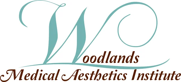 Woodlands Medical Aesthetics Institute: Johnny Peet, MD logo
